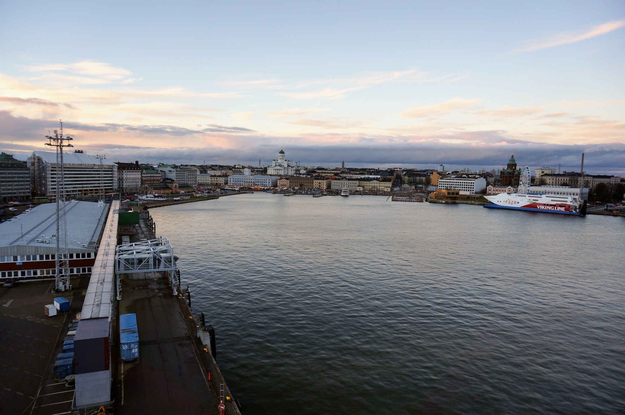 Aboard a ferry docked at Olypmia Terminal, towards the left is Makasiini terminal, and to the right, a Viking Line ship docked at Katajanokka.